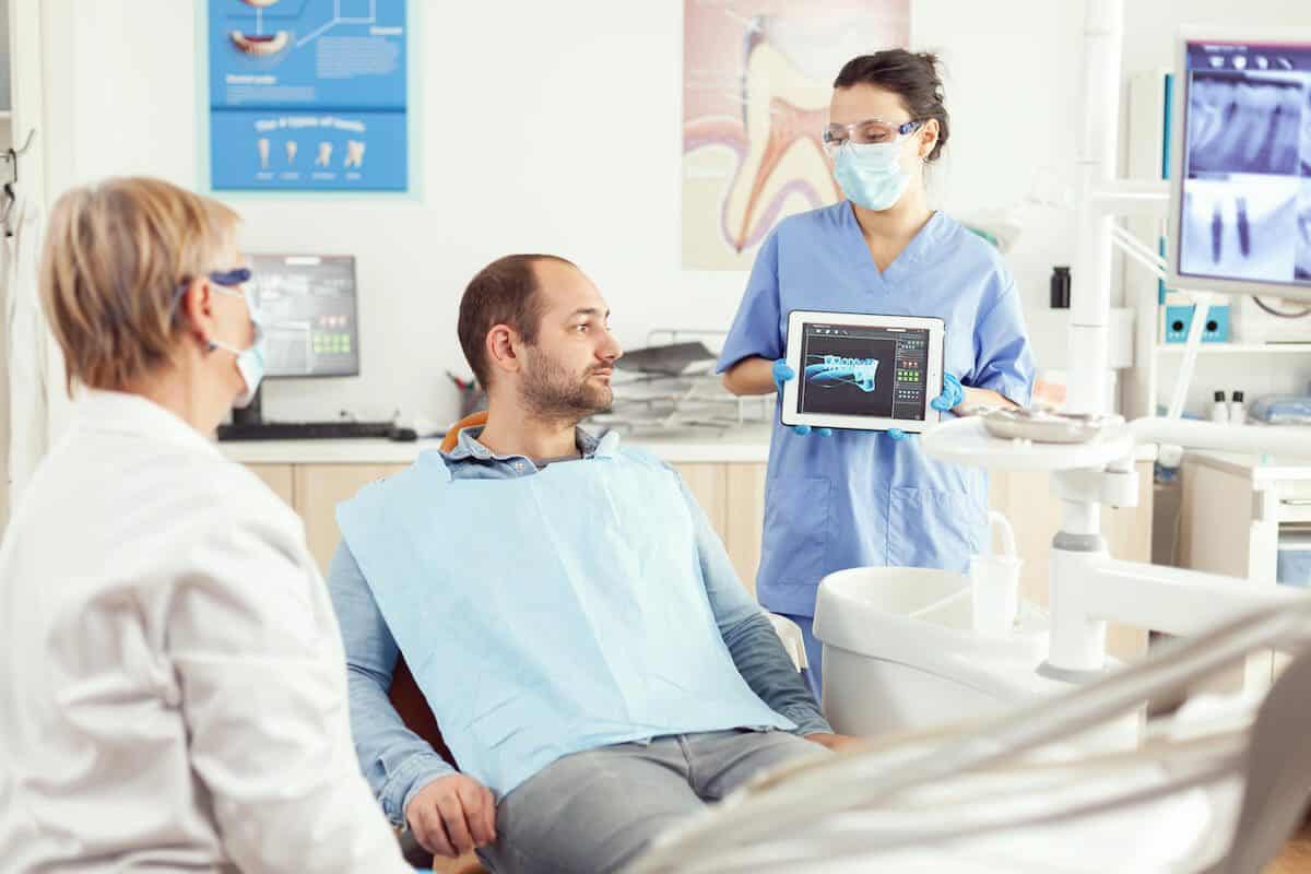 Laser teeth whitening treatment being applied by a dental professional Huddersfield
